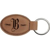 SKU: GFT176 – 3″ x 1 3/4″ Dark Brown Laserable Leatherette Oval Keychain